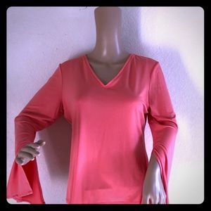 A classic Calvin Klein, V neck blouse in salmon.
